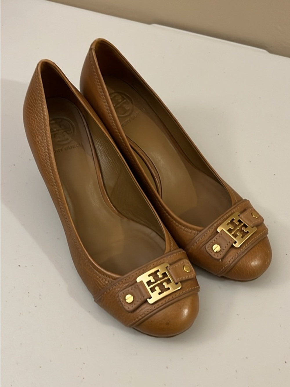 Tory Burch Cognac Leather Wedge Pumps with Gold Logo
